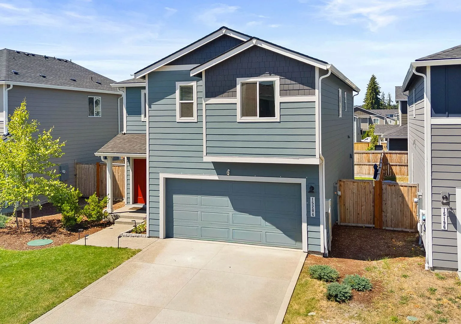 Spacious 3-Bedroom Home with Bonus Room, Main-Floor Den & Covered Patio Near JBLM — Photo 1