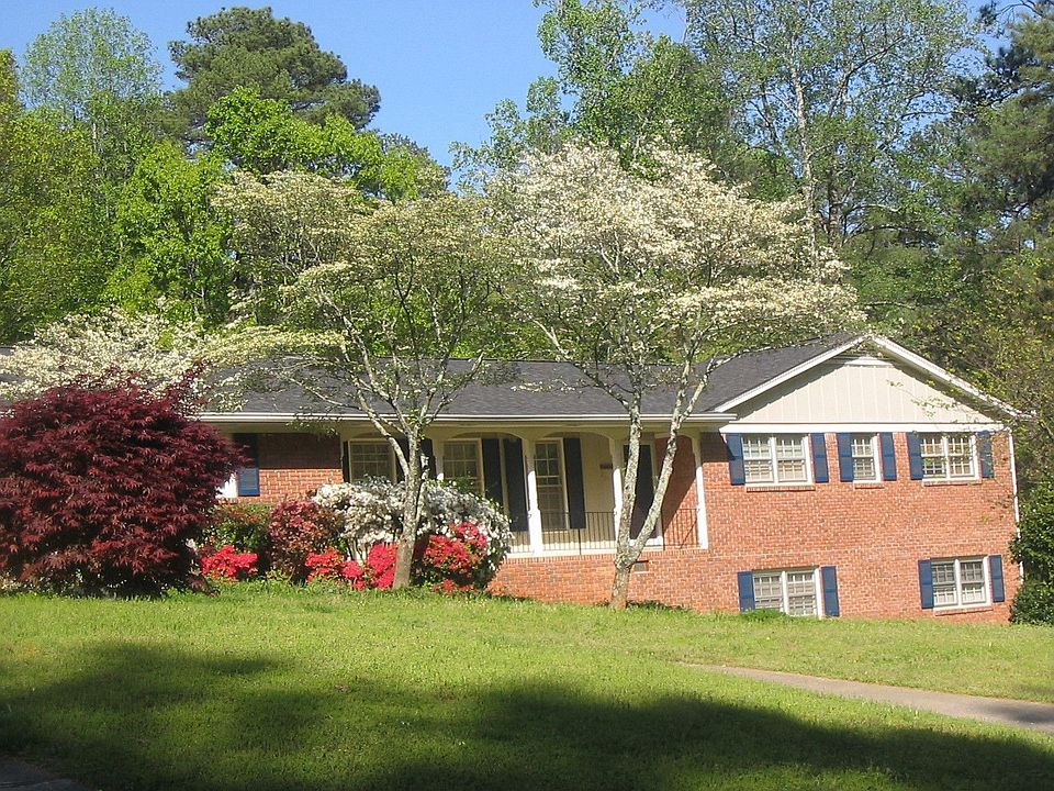 Azalaes and dogwood trees in front yard