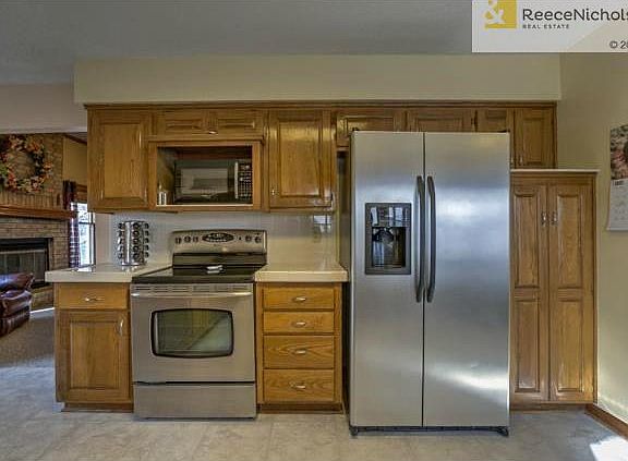Open kitchen with stainless steel appliances