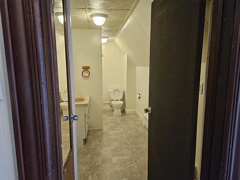 Full bathroom with tub, shower, sink and toilet