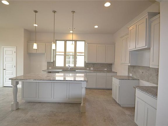 This kitchen is the star of this home! Beautiful Custom made site finished cabinets, fantastic oversized island!