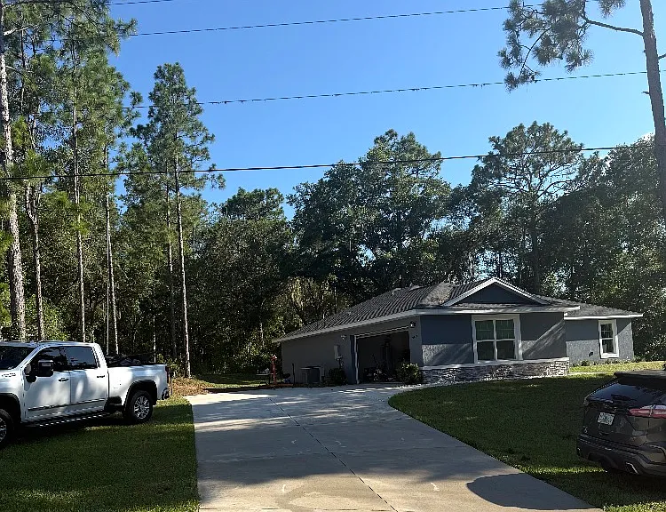 10448 N Athenia Dr — Photo 2