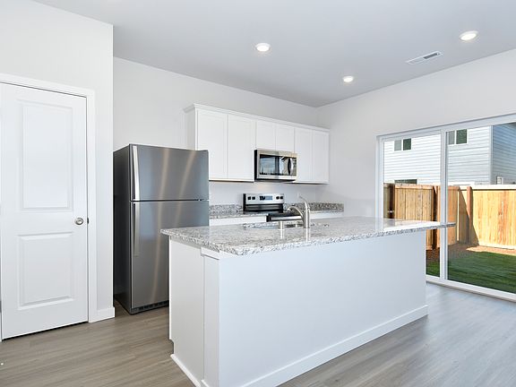 A spacious breakfast bar is the perfect space for a quick meal.
