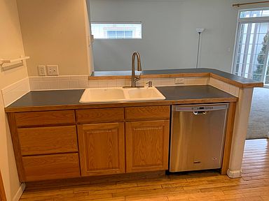 Kitchen counter top open to Family Room