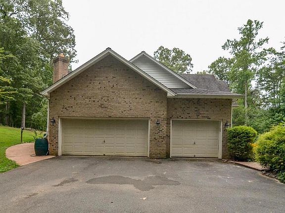 Side Load Three Car Garage w/Remotes