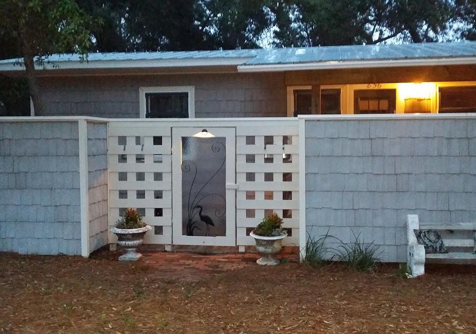 Entrance w vintage urns, city bench & custom gate w 1950'S h