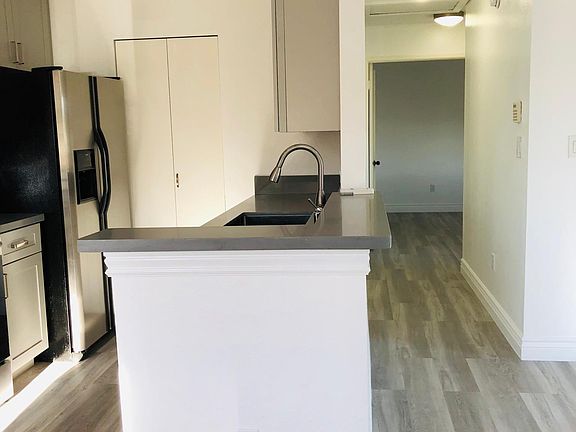 Hallway to bathroom and bedrooms