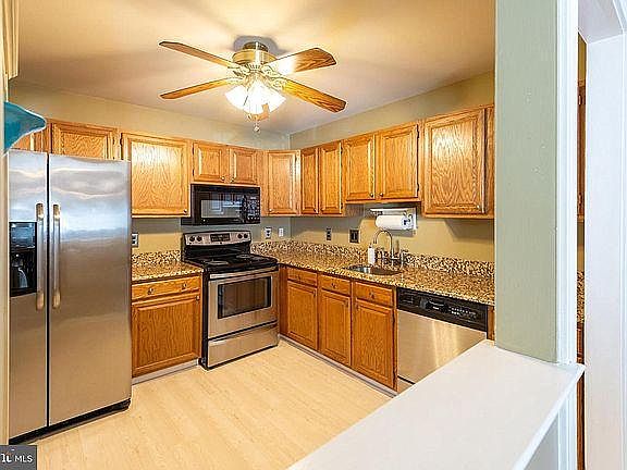 Kitchen with granite top and Stainless Steel appliances