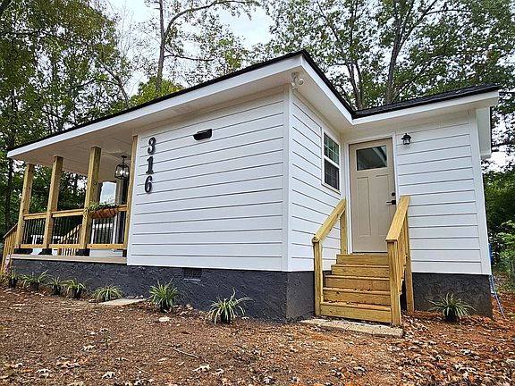 Front and angled view of second entry door (to laundry room)