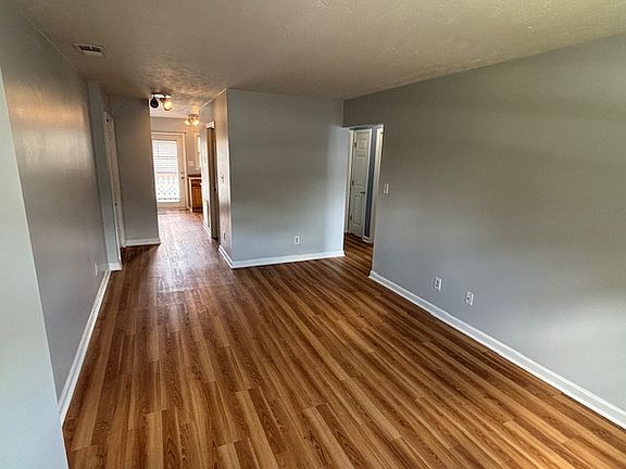 Living Room looking toward kitchen and back deck.