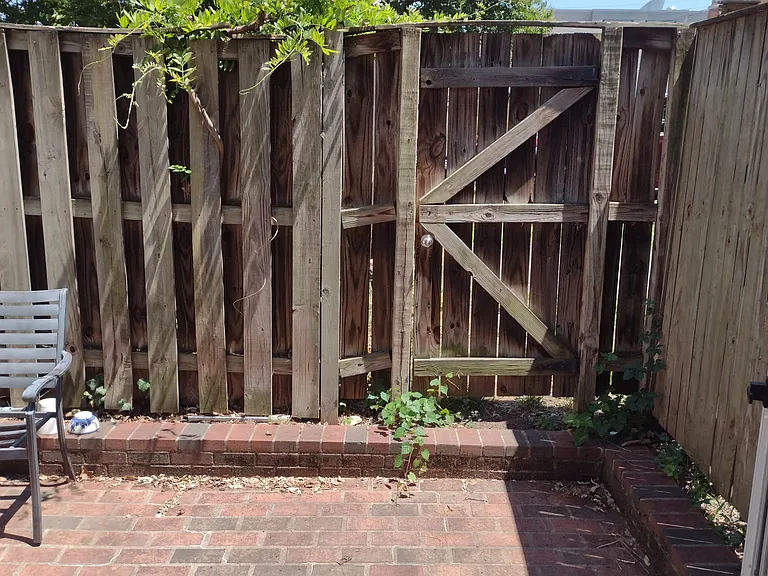 Patio has space for a grill and seating