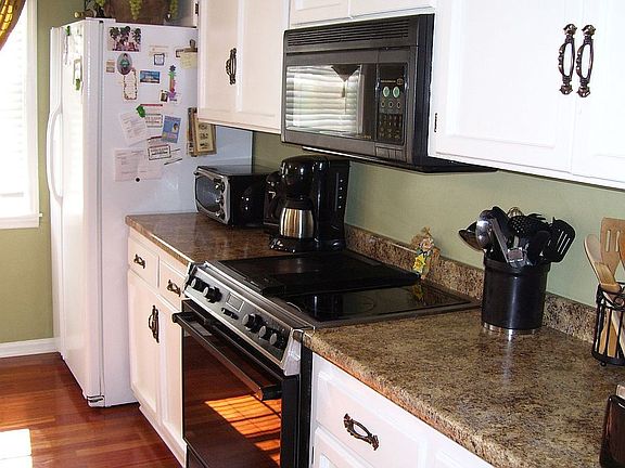 Kitchen has double pantries & plenty of counter space