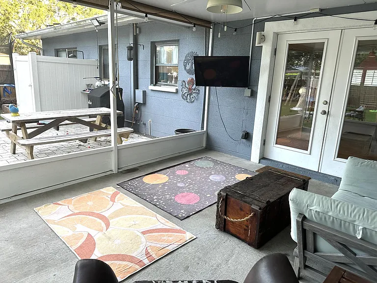 120 sf screen porch with TV