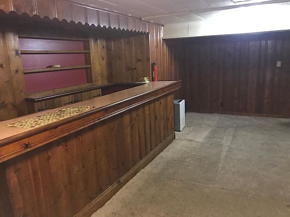 Living room and closer view of bar area