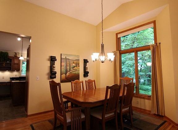 Adjoining dining room has a tall vault, and transom windows for extra light...
