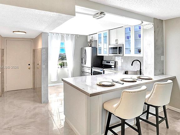 5th image of 3940 Inverrary Blvd APT 703A