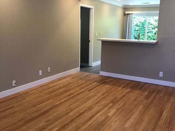 Family room, sit up bar, view to backyard from kitchen