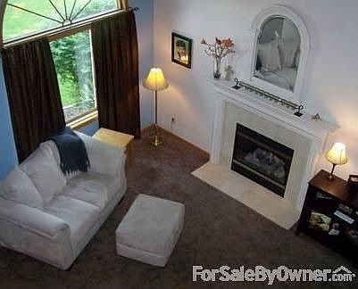 Great Room
						:
						Vaulted ceiling in the Great Room with open staircase.