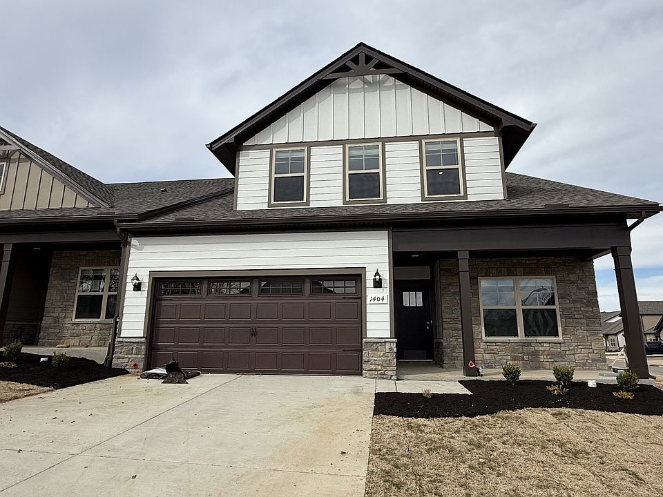 File photo NEW middle unit 3 3, 2 car, 2 bedrms down 2 bath, 1 bedrm bath up, great rm kitchen, cov