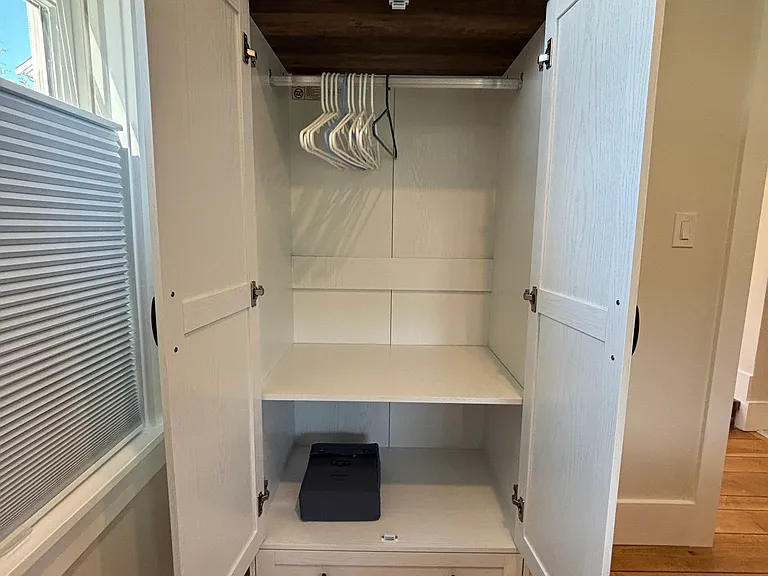Downstairs: front bedroom armoire