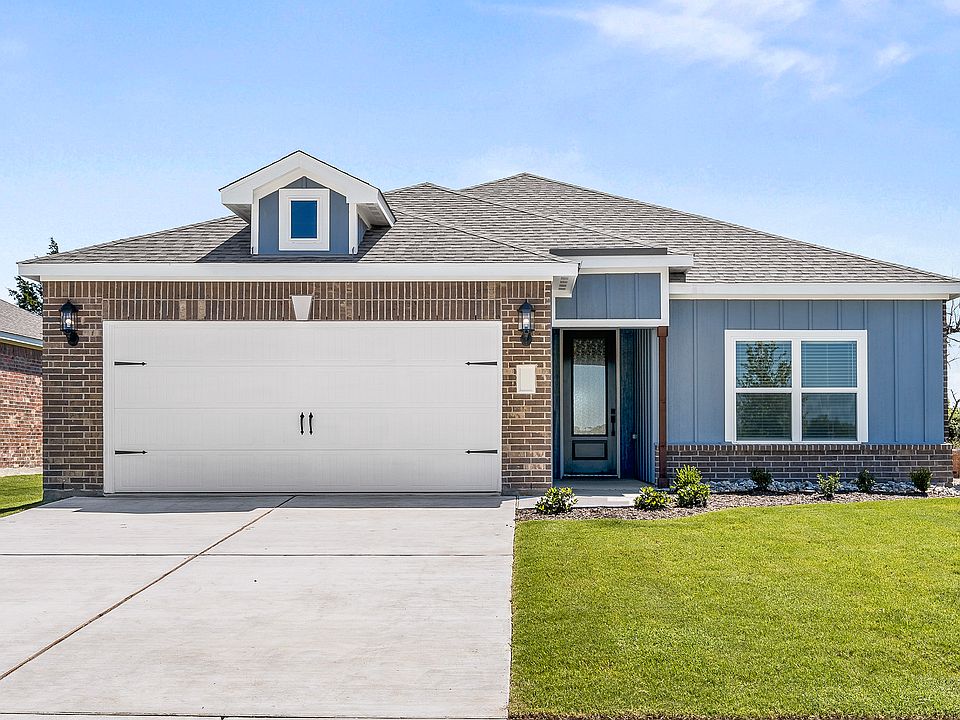 The one-story Rio Grande floor plan has a beautiful brick and siding exterior.