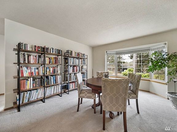 Lower end of a very large living and dining area.