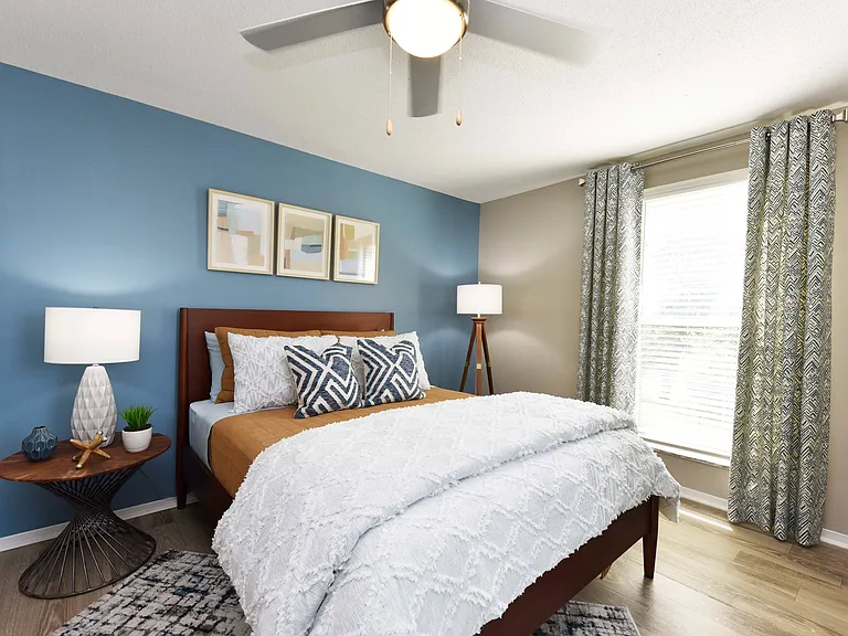 Bedroom with hardwood-style flooring