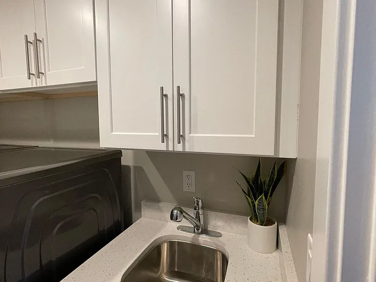 Laundry room sink - quartz countertops
