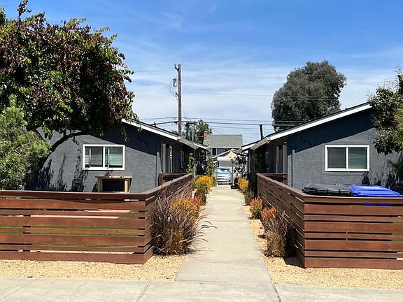Entrance to front of property. This unit is the back unit on the right.