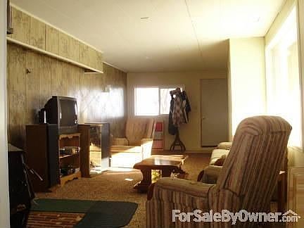Family Room : Wood burning stove is located in the family room.