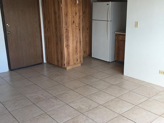 Front door & Kitchenette