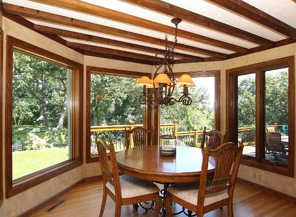 INFORMAL DINING SURROUNDED BY WINDOWS AND WONDERFUL VIEWS.  GREAT ENTERTAINING SPACE