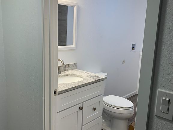 downstairs bathroom/washer dryer hookup with shower