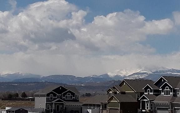 Views of Longs Peak to South from deck off kitchen. Master bedrooms both have mountain views.