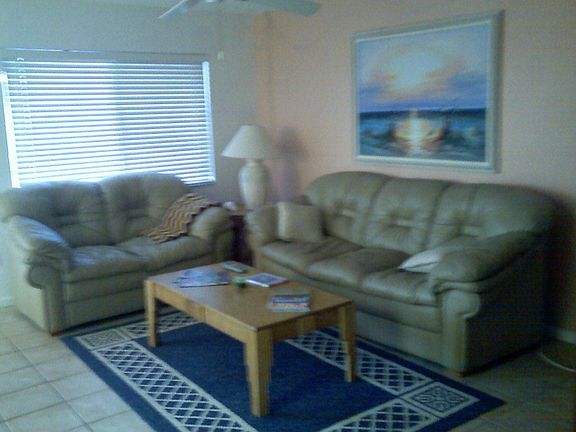 Living Room w/ Window to Balcony