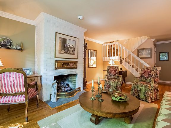 Living Room with Gas Fireplace and Hardwood Floors