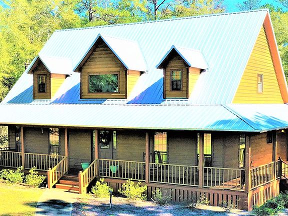 Image 2: Front View Showing Wrap-Around Deck