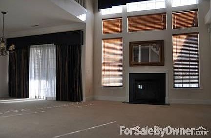 Living and Dining Areas
						:
						View of living and dining areas from the stairs leading to the upstairs loft.