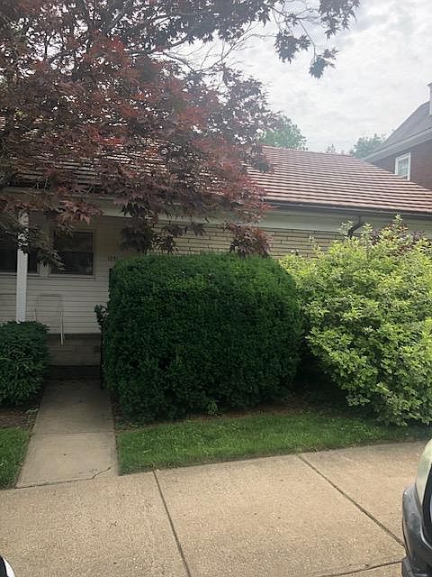 Outside view, apartment located on the first floor of a duplex.