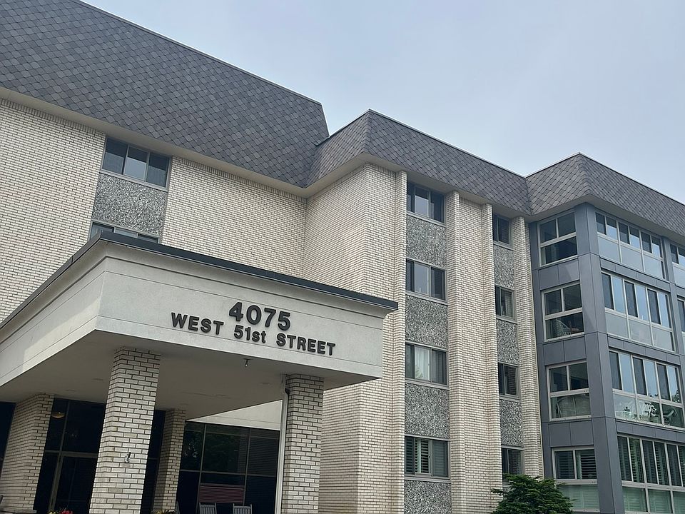 Solid concrete building; porch facades and windows recently updated. Located in the PERFECT location with important amenities (e.g., grocery store, bank, post office, drug store), and restaurants and entertainment within 2-3 blocks.