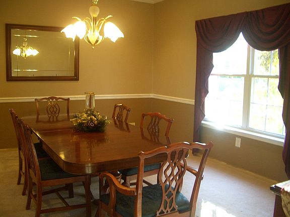 Freshly Painted Dining room with chair railing