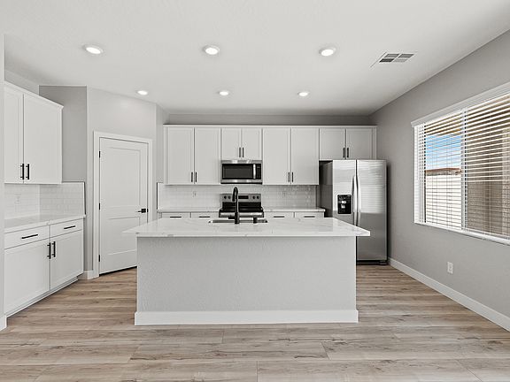 This floor plan has a spacious breakfast bar perfect for a quick meal.