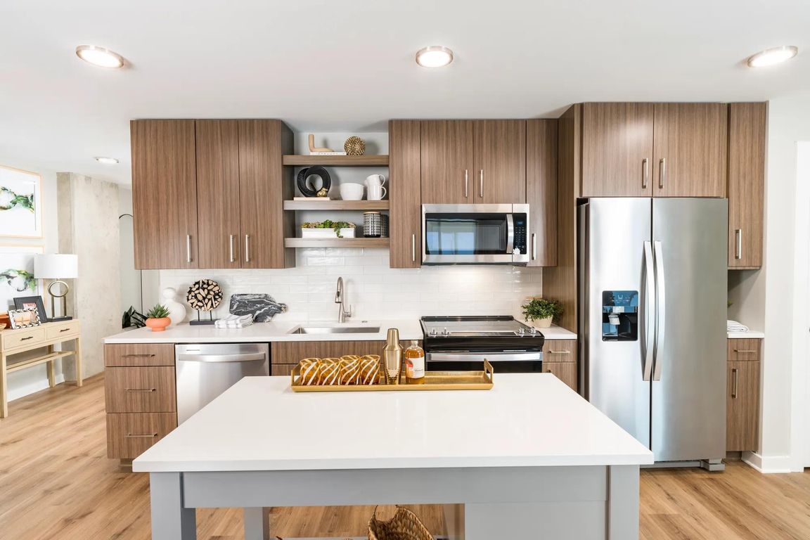 Custom cabinetry and quartz counters in a true chef's kitchen.