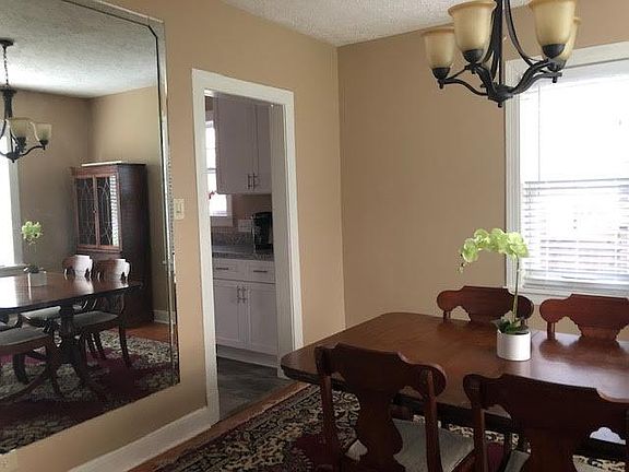 Separate dining room/den or office.