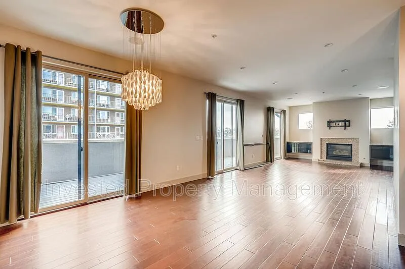Building Photo - 3420 W 32nd Ave #303