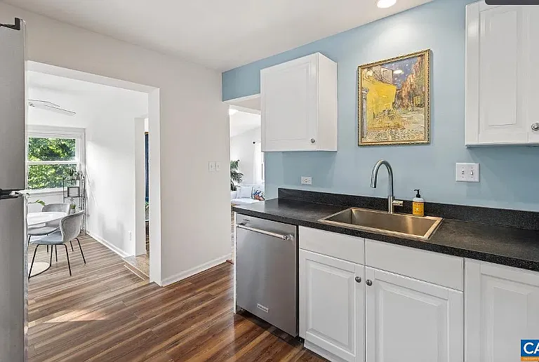 kitchen view to sunroom and sitting room