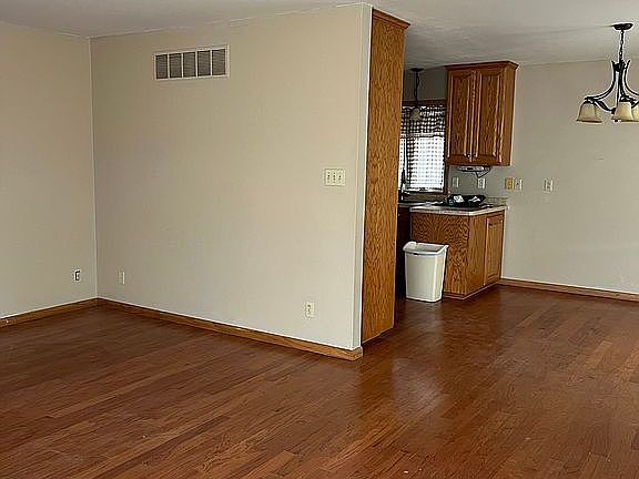 Living room facing kitchen