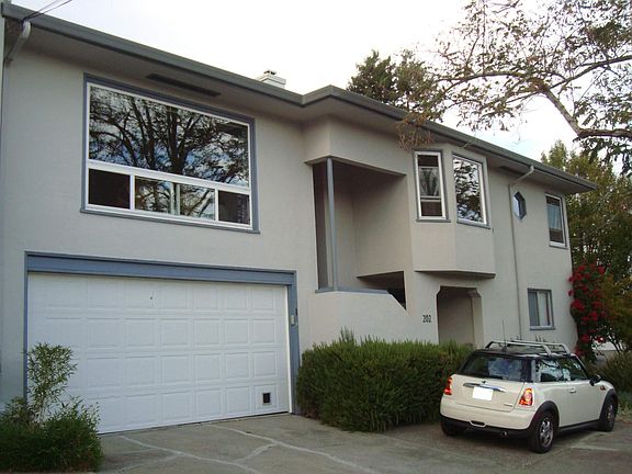 Private 2 car garage; private stairway to entrance;