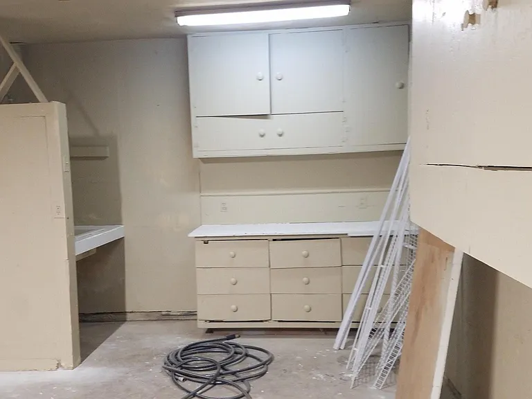 Two car garage with work bench and sink