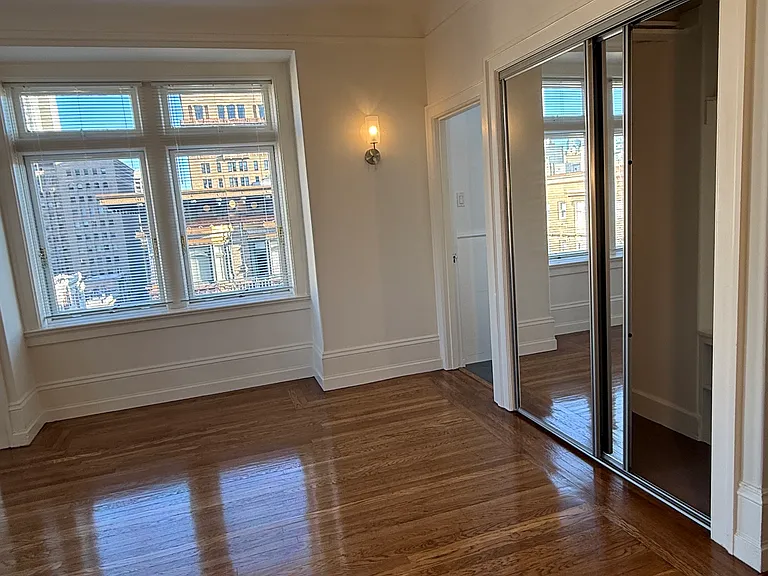 mirrored closet doors & bedroom window south